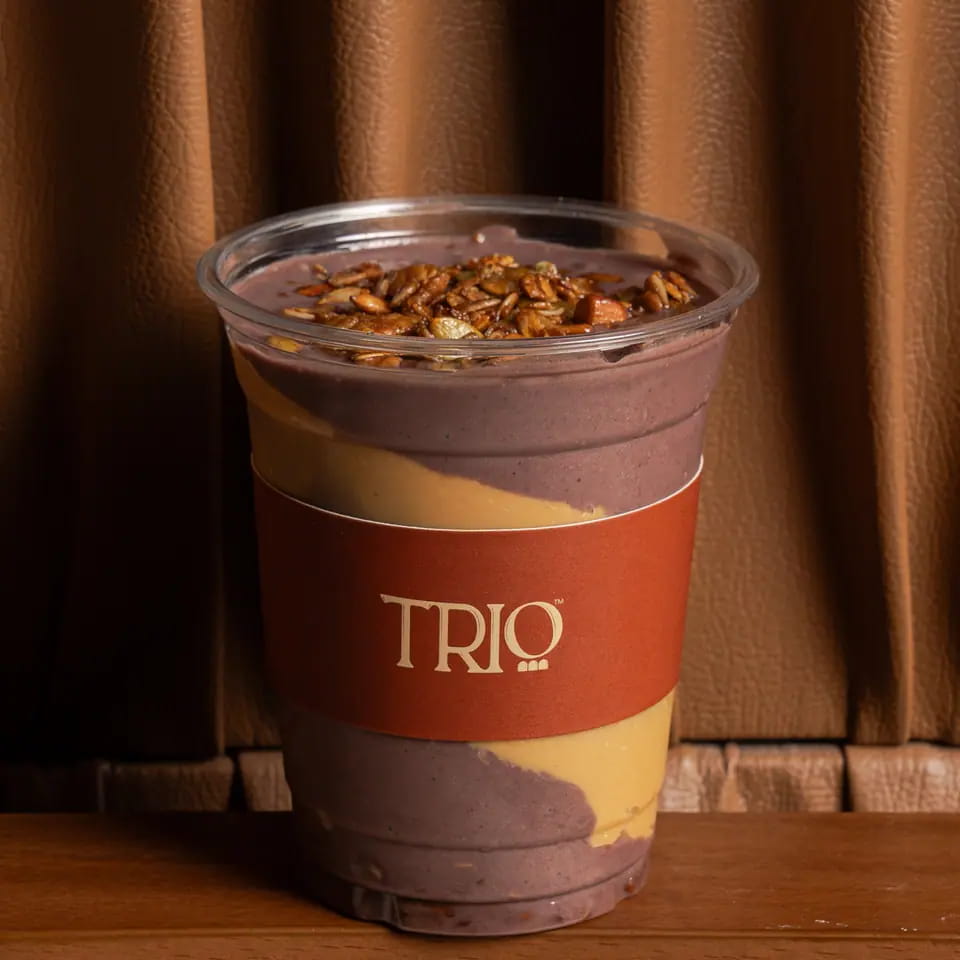 Acai smoothie with granola in a TRIO takeaway cup