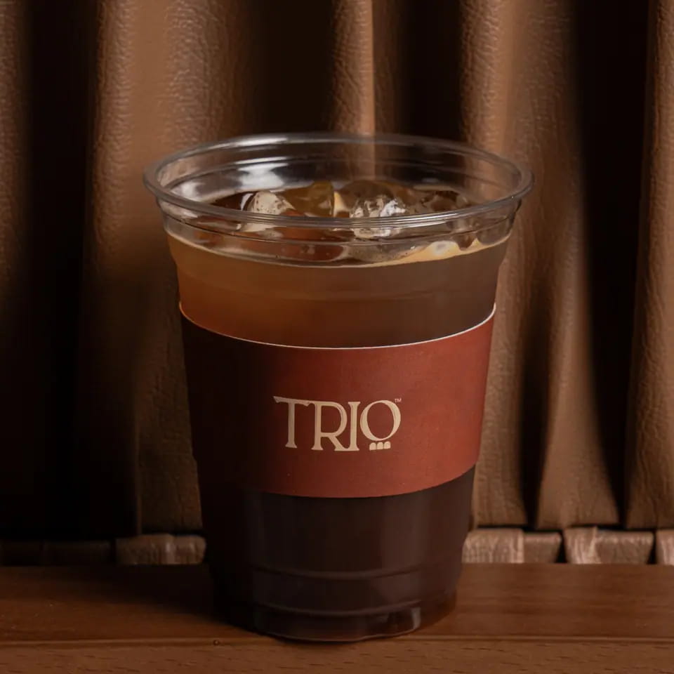 Iced Americano in a TRIO takeaway cup