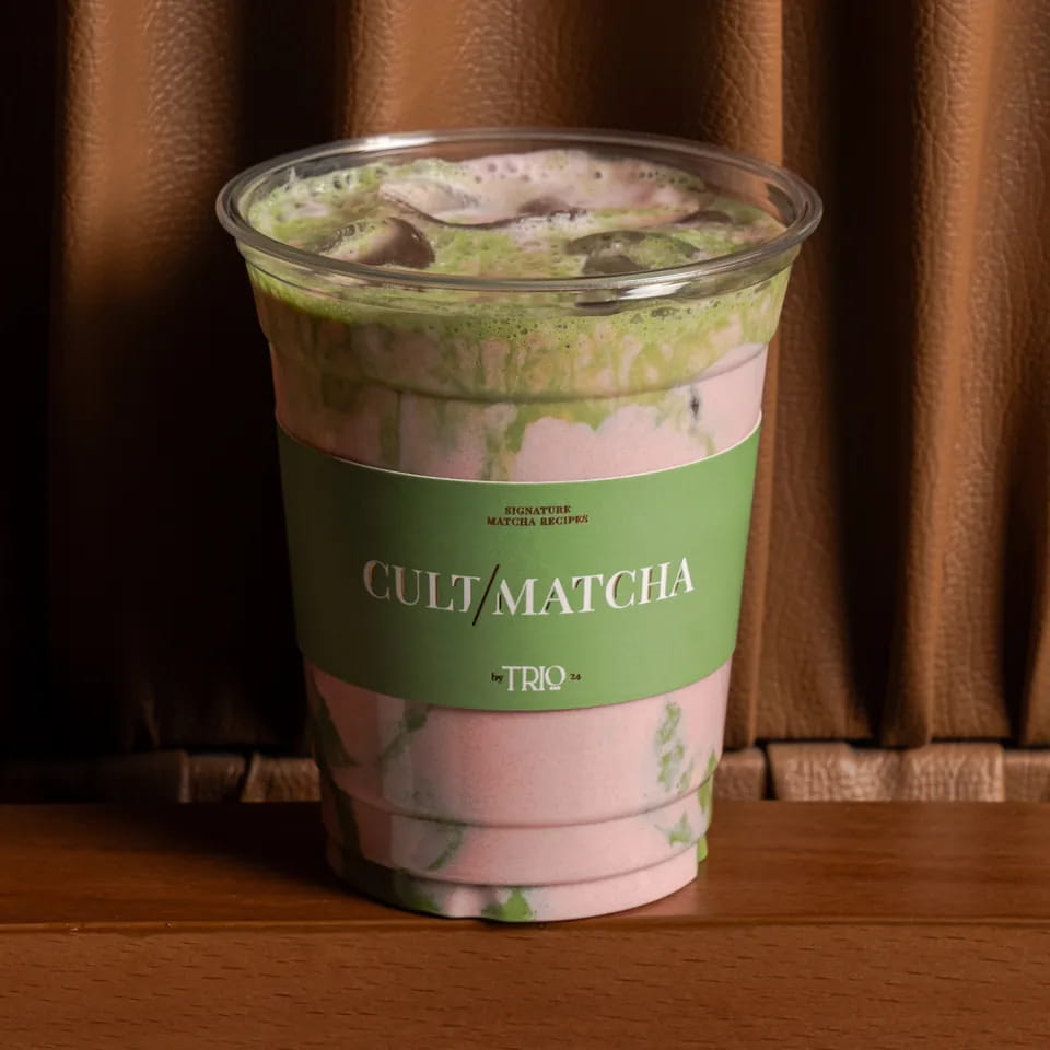 Marble strawberry matcha in a Cult Matcha takeaway cup